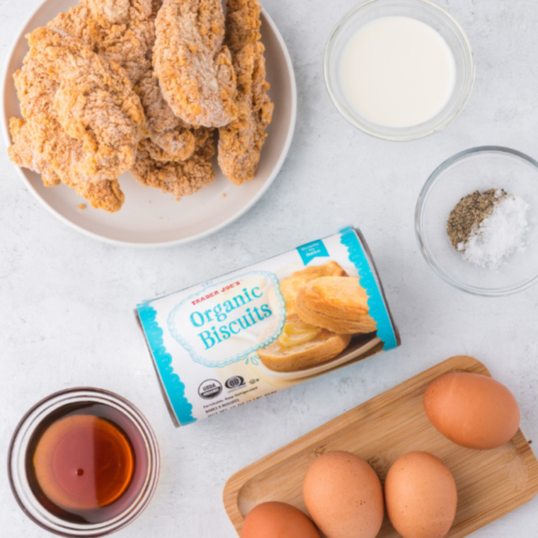 Ingredients needed for Air Fryer Chicken Biscuit Sandwich on a marble tabletop.