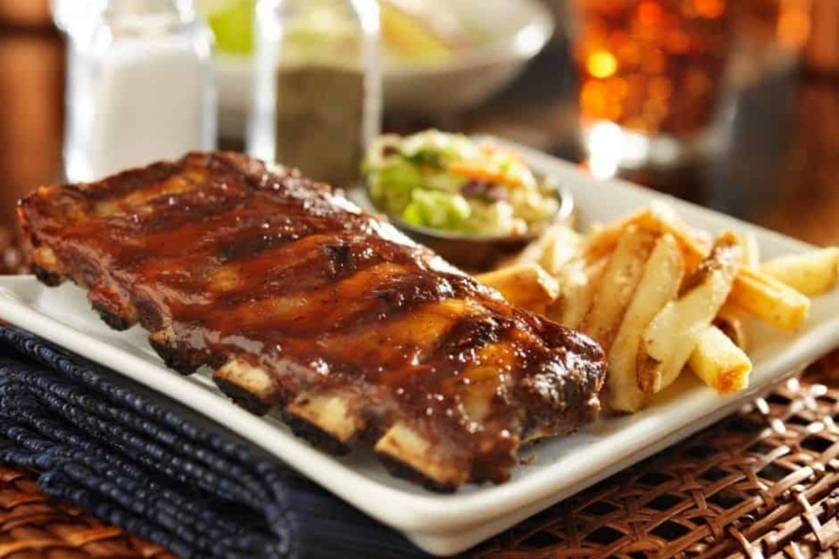 Air fryer baby back ribs on a plate.