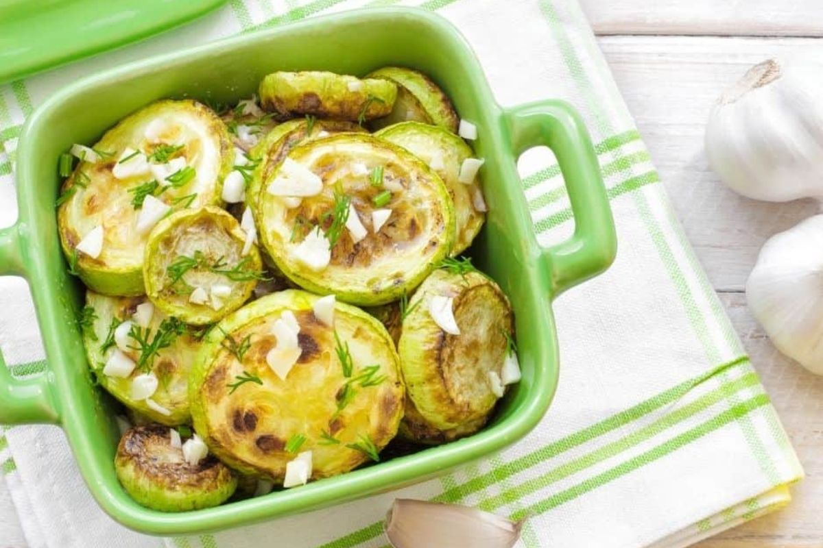 Air fryer garlic zucchini in a dish.