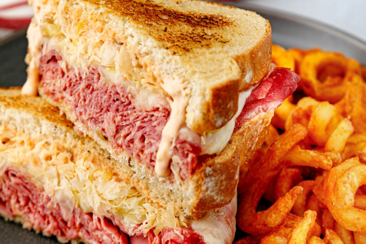 An Abry's reuben sandwich and curly fries.