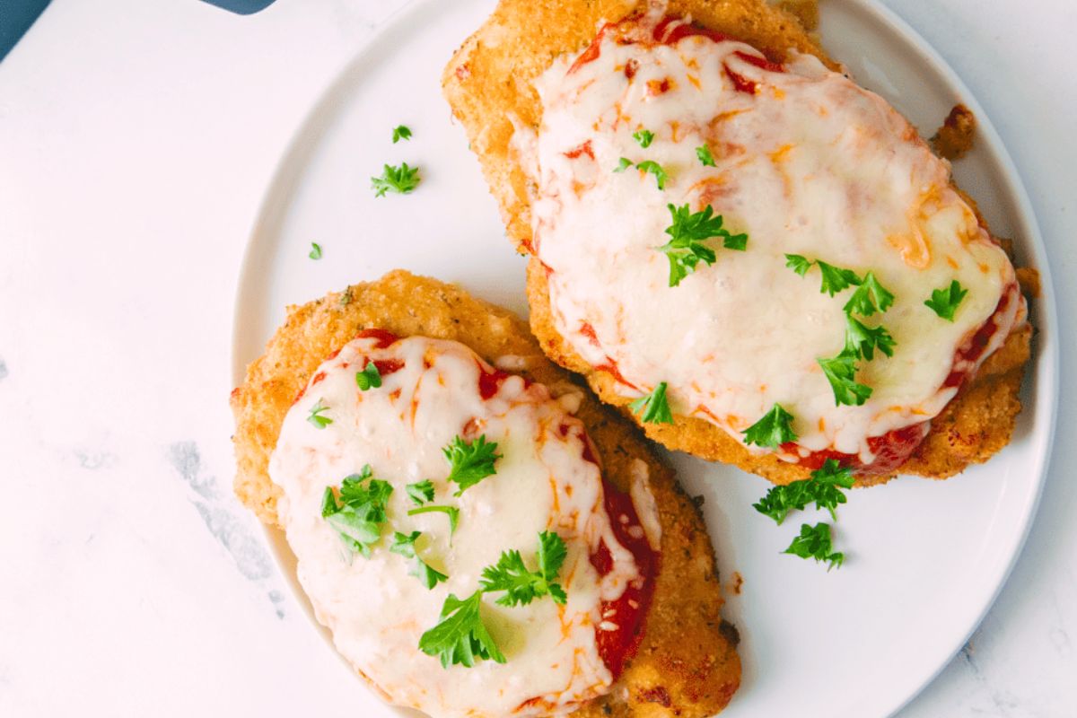 Chicken parmesan on a plate.