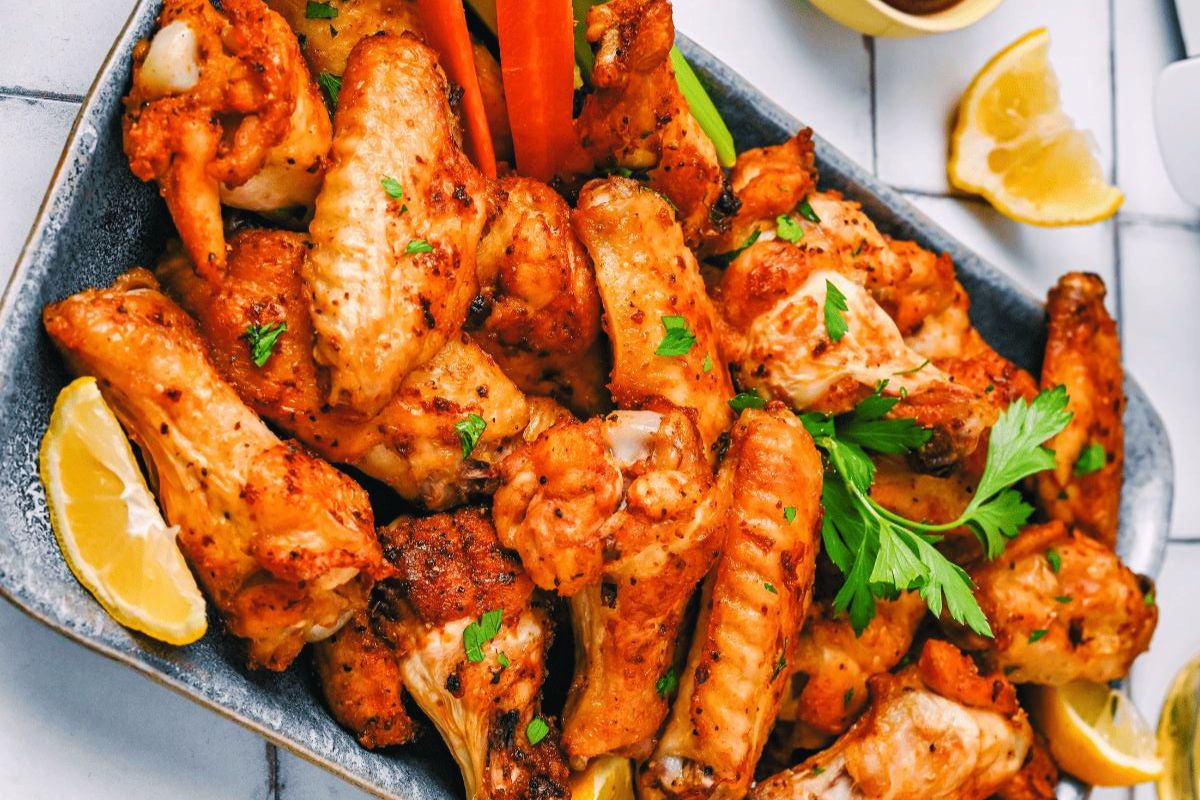 General Tso chicken wing on a tray.