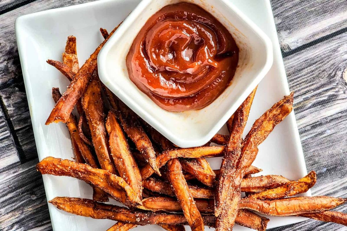 Spicy air fryer sweet potato fires and ketchup.