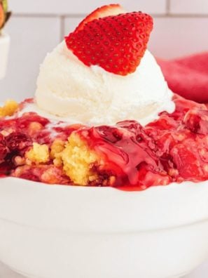 Strawberry dump cake in a bowl.