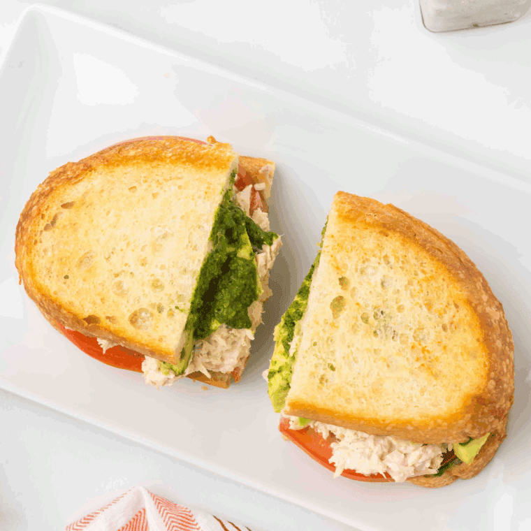 Delicious Copycat Panera Tuna Salad Sandwich made with creamy tuna salad, fresh vegetables, and served on soft bread.