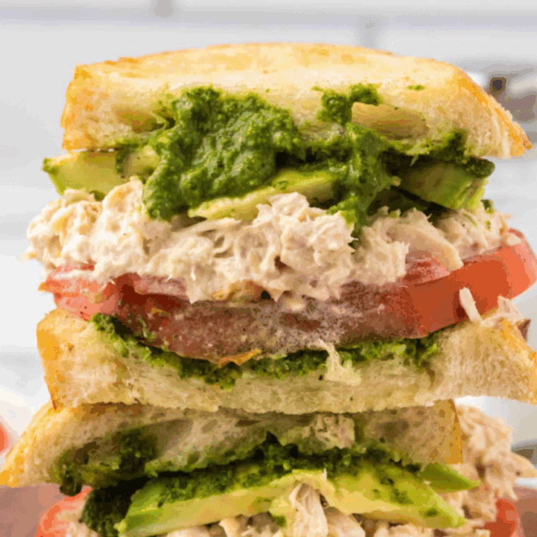 Delicious Copycat Panera Tuna Salad Sandwich made with creamy tuna salad, fresh veggies, and served on soft bread.