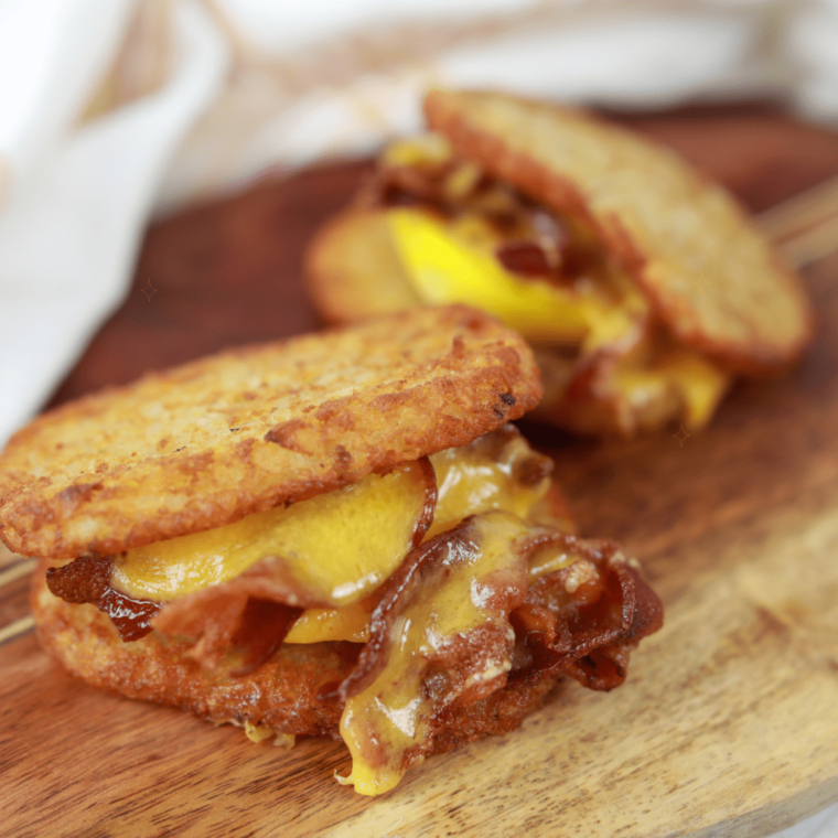closeup side view: trader joes hashbrown air fryer recipe used as bread for a bacon, egg, and cheese sandwich