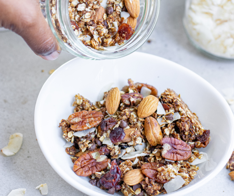 Air Fried Muesli in bowl, being poured