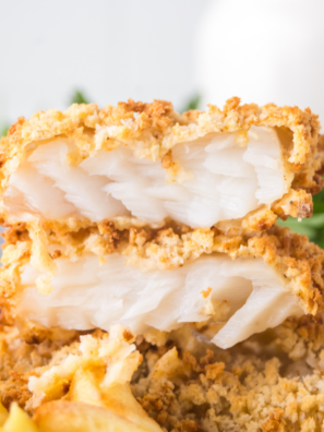 Close-up of copycat Golden Corral baked fish with lemon butter and fresh parsley