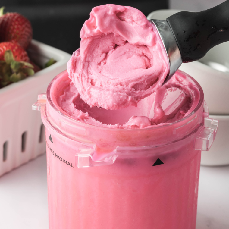 "Ninja Creami Pink Drink sorbet served with diced strawberries on top."