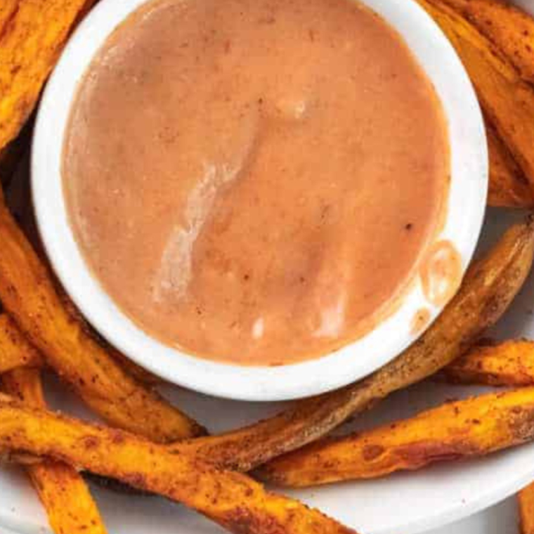 Copycat Heinz Mayochup sauce in a small bowl, showcasing its creamy texture and rich color, ideal for serving with fries and burgers.