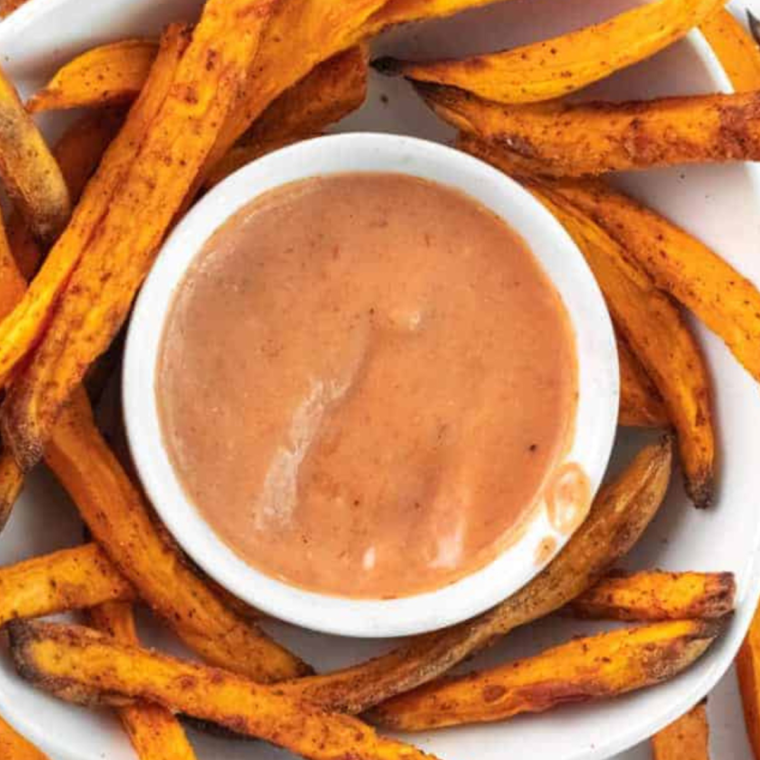 
"Homemade Copycat Heinz Mayochup in a bowl, showcasing its creamy texture and vibrant color, perfect for dipping or spreading."