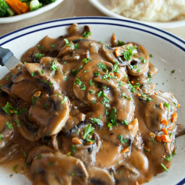 Copycat Olive Garden Creamy Mushroom Sauce served over pasta