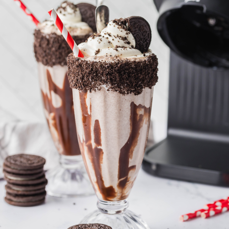 Close-up of a homemade Sonic Oreo chocolate shake with a straw.