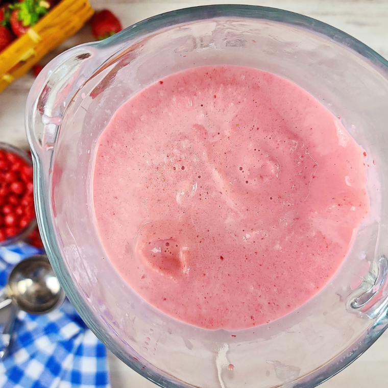 Blend the strawberry milk, whole milk, cool whip and sweetened condensed milk, into a large mixing bowl.