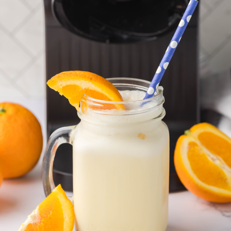 Finished Ninja Creami Orange Julius topped with whipped cream