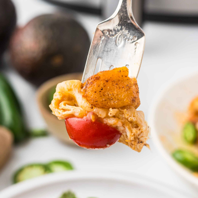 Plate of crispy Trader Joe’s Air Fryer Cauliflower Gnocchi served with a side of dipping sauce