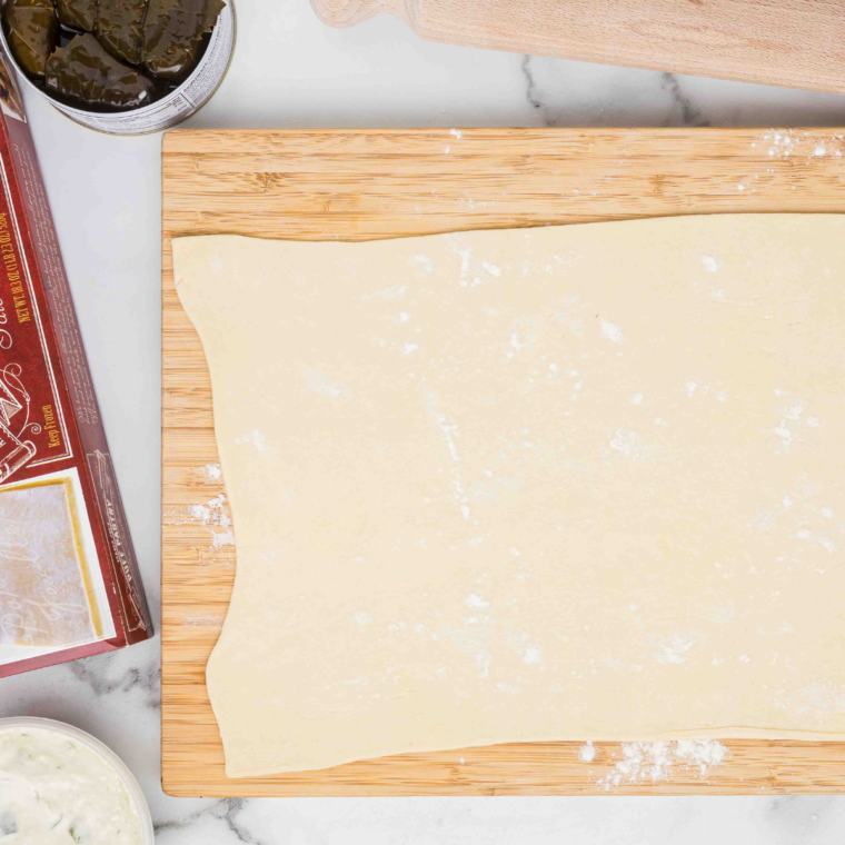 Ingredients for Air Fryer Stuffed Grape Leaves laid out on a kitchen countertop.