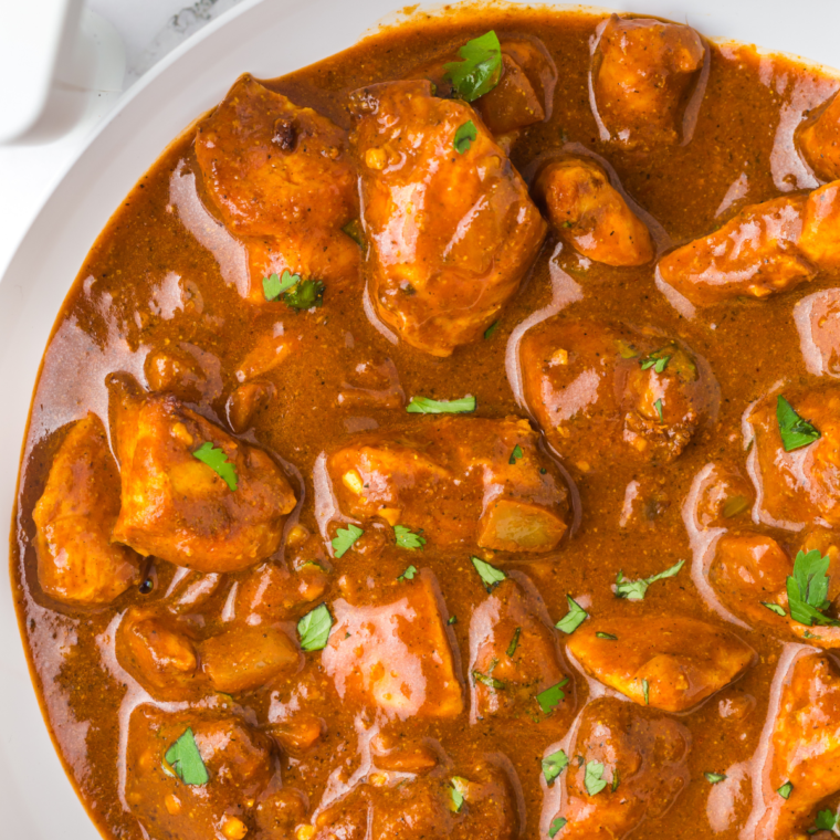 "Air fryer chicken vindaloo marinade ingredients in a bowl"
