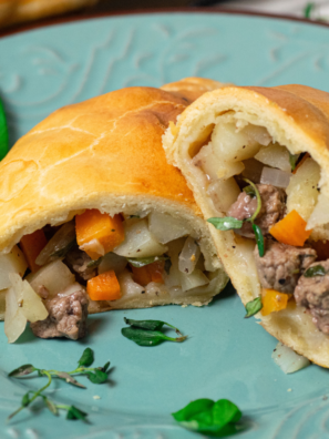 Golden, flaky Air Fryer Cornish Pastry with a savory meat and vegetable filling."