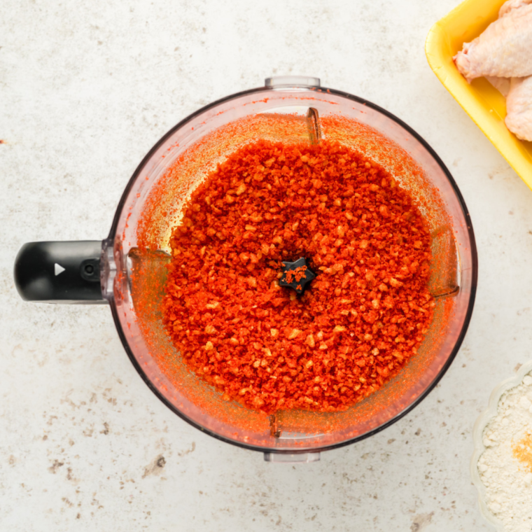 Crushing the Cheetos in a food processor.