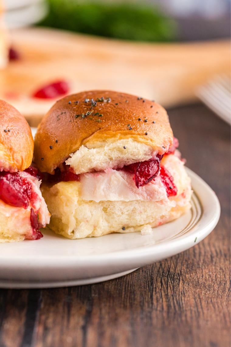 Air Fryer Leftover Thanksgiving Sliders filled with turkey, stuffing, and cranberry sauce, crispy and golden brown.