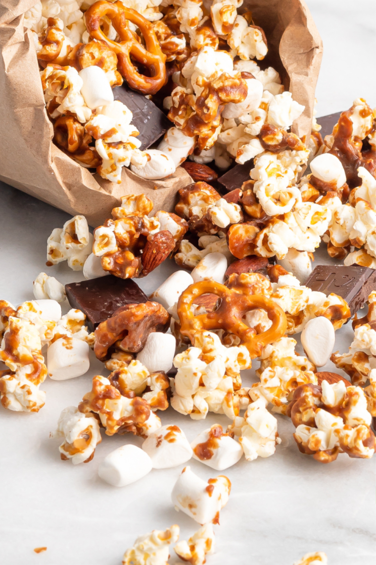 Air Fryer Moose Munch Caramel Popcorn with a mix of popcorn, pretzels, almonds, and homemade caramel coating, air fried to golden perfection.