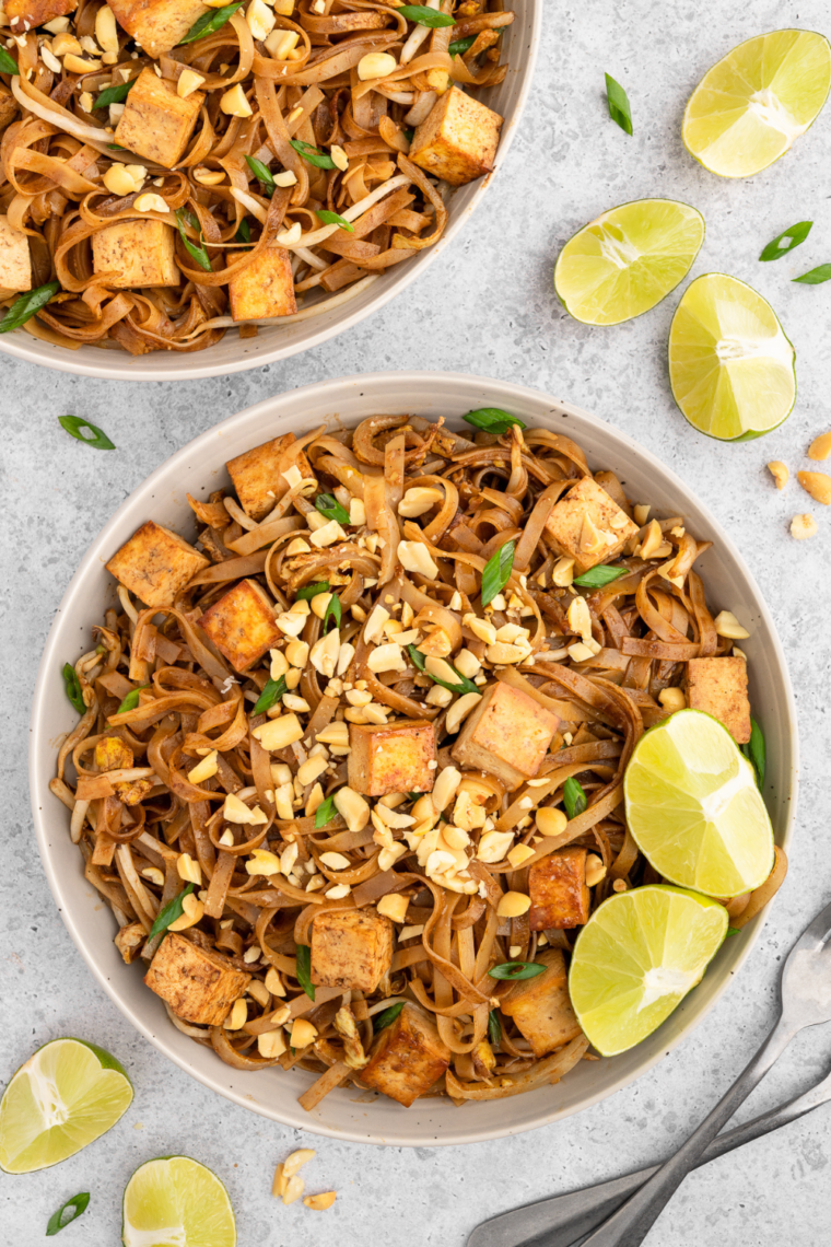 Close-up of Air Fryer Pad Thai on a plate with colorful veggies and savory sauce.