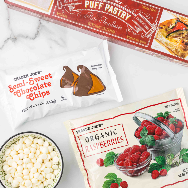 Ingredients needed for Air Fryer Raspberry Chocolate Puffs on kitchen table.