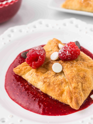 Delight in the irresistible Air Fryer Raspberry Chocolate Puffs, featuring flaky puff pastry filled with sweet raspberries and creamy chocolate. A quick and elegant dessert for any occasion!"