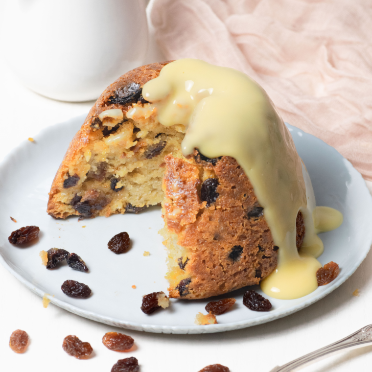 Classic British Air Fryer Spotted Dick pudding with currants, served for dessert.