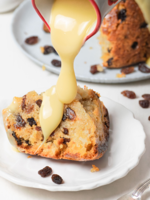 Golden, fluffy Air Fryer Spotted Dick served warm with currants."