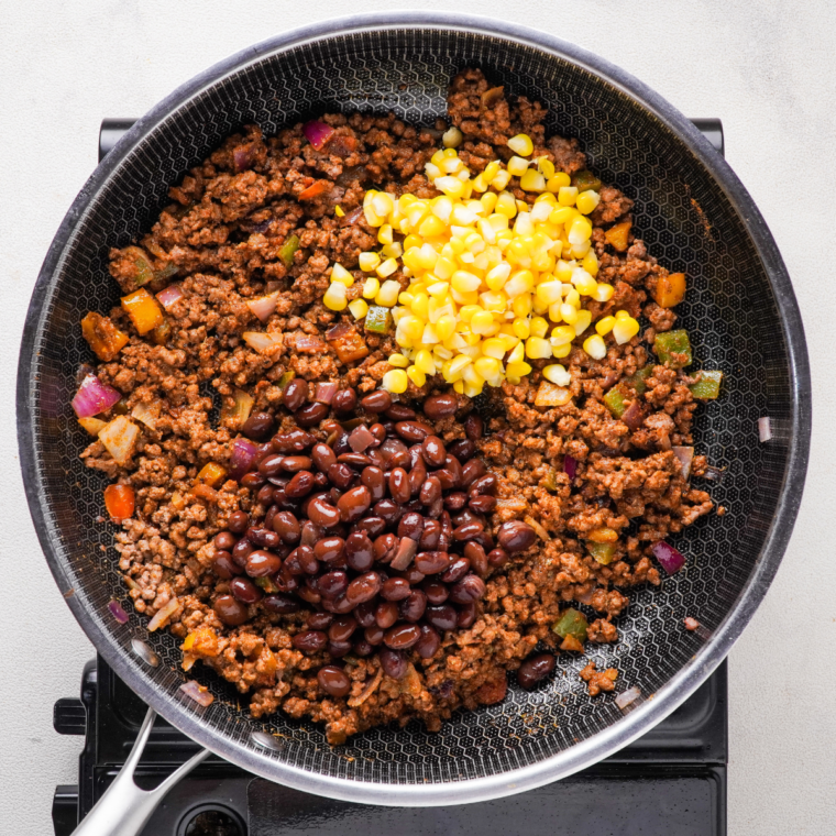 Browned ground beef with taco seasoning for Air Fryer Taco Fiesta Bubble Up Casserole.