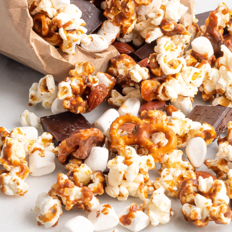 Air Fryer Moose Munch Caramel Popcorn with popcorn, almonds, pretzels, and mini marshmallows, drizzled with homemade caramel and air fried to perfection.