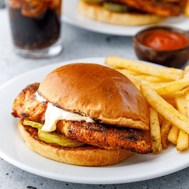 "Homemade Blackened Ranch dip with Cajun spices in a small bowl, perfect for dipping fried chicken, fries, or veggies"