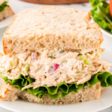 A vibrant Cape Cod Chicken Salad with fresh greens, cranberries, walnuts, and grilled chicken.