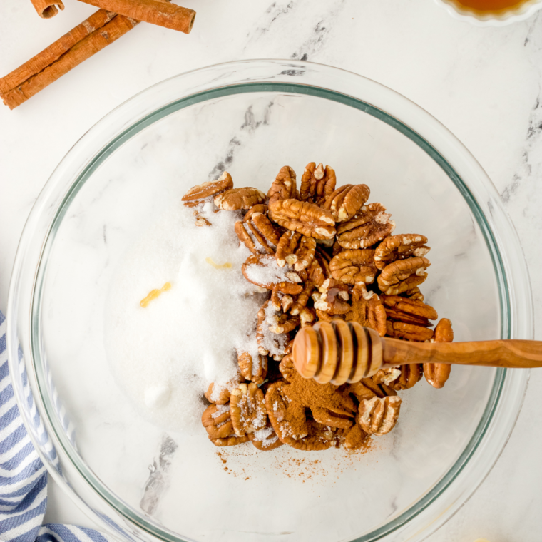 "Step-by-step process of making Copycat Buc-ee’s Pecans with egg white, cinnamon, sugar, and pecan halves in the oven."