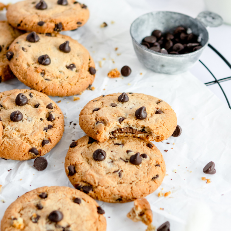 A plate of Copycat Potbelly Oatmeal Chocolate Chip Cookies with golden-brown edges and gooey chocolate chips.