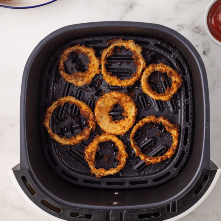 "Perfectly golden and crispy Copycat Sonic onion rings, coated in a crunchy batter and breadcrumbs, ready to enjoy."