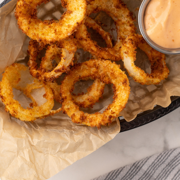 Golden and crispy homemade Copycat Sonic Onion Rings with a light batter and breadcrumbs, ready to be served.