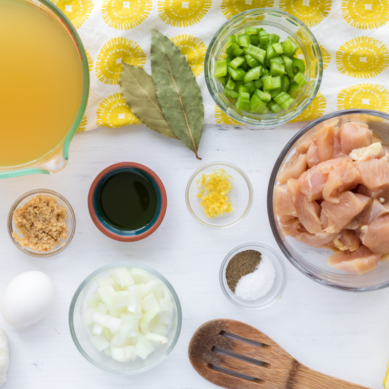 Ingredients for Demo’s Chicken and Rice Soup, including chicken, rice, vegetables, and herbs