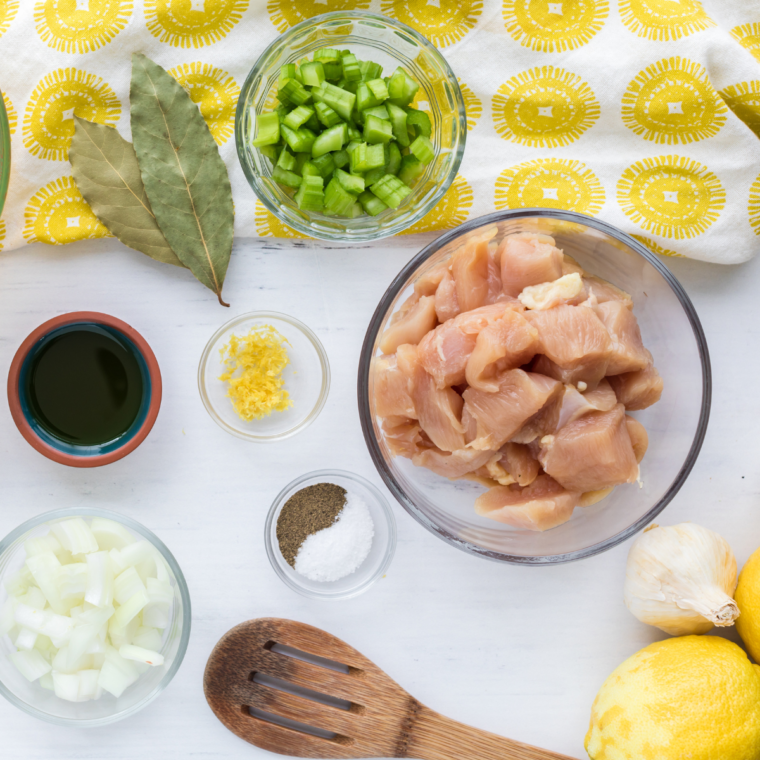 Step-by-step image of chopping chicken breasts for Demo’s Chicken and Rice Soup.