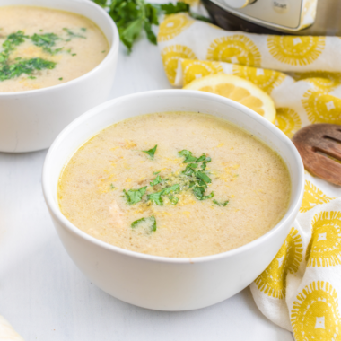 "Bowl of Demo’s Chicken and Rice Soup, filled with chicken, rice, and vegetables, ready to serve"