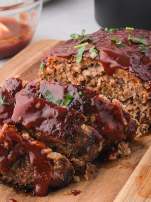 "Recreate the comfort of Golden Corral's famous meatloaf at home with this easy and flavorful recipe. Tender ground beef combined with a savory glaze and seasonings, this meatloaf is perfect for a hearty family meal!"