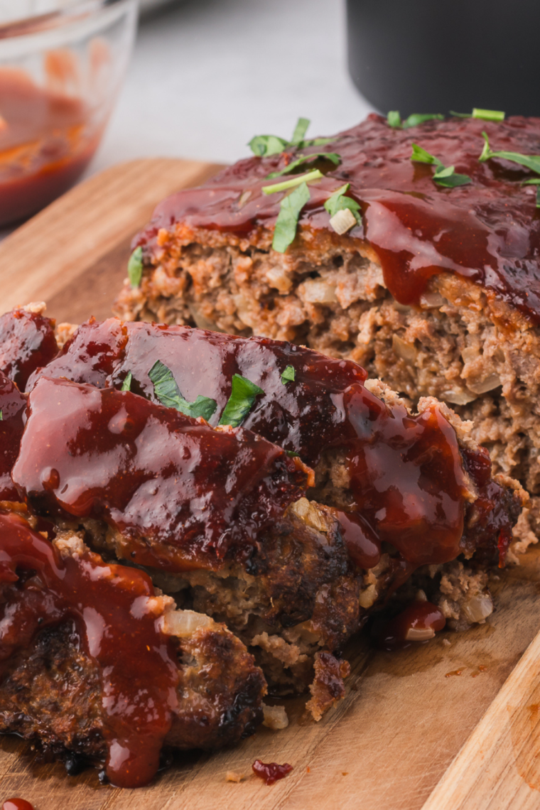 "Golden Corral-style meatloaf with a savory ketchup glaze, ready to serve"