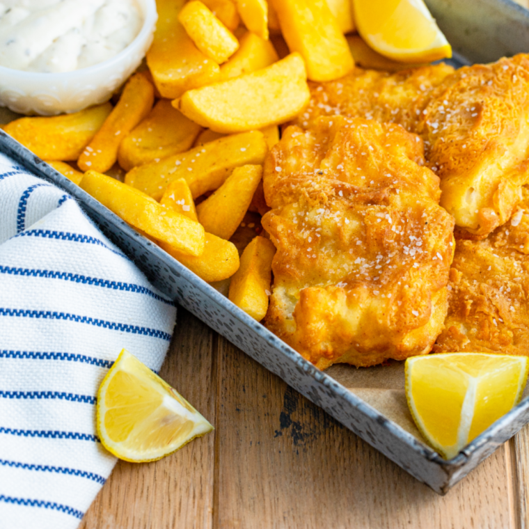 "Bowl of creamy homemade Long John Silver’s tartar sauce with a spoon, ready to serve"