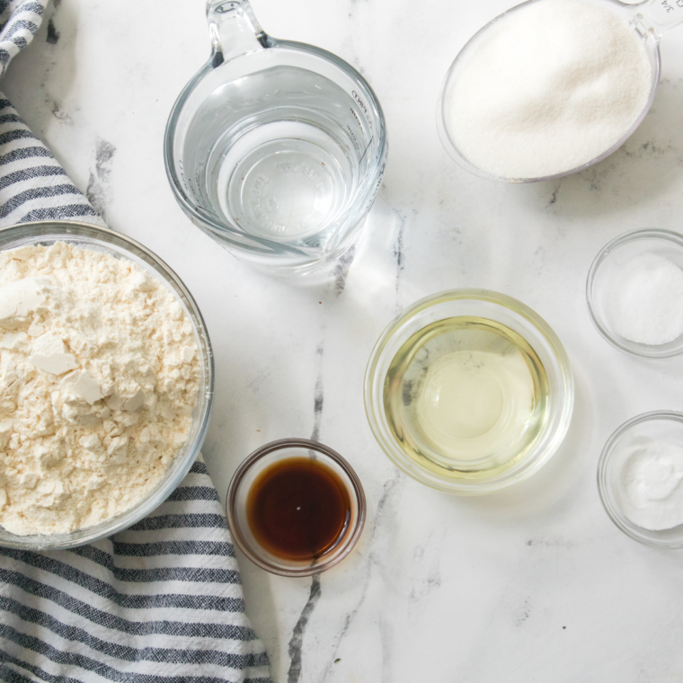 Ingredients needed for Maggiano’s Butter Cake Recipe on kitchen table.