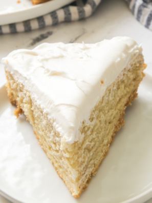 Delicious Maggiano’s Butter Cake served with vanilla ice cream and fresh berries."