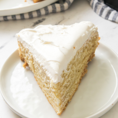 Delicious Maggiano’s Butter Cake served with vanilla ice cream and fresh berries."