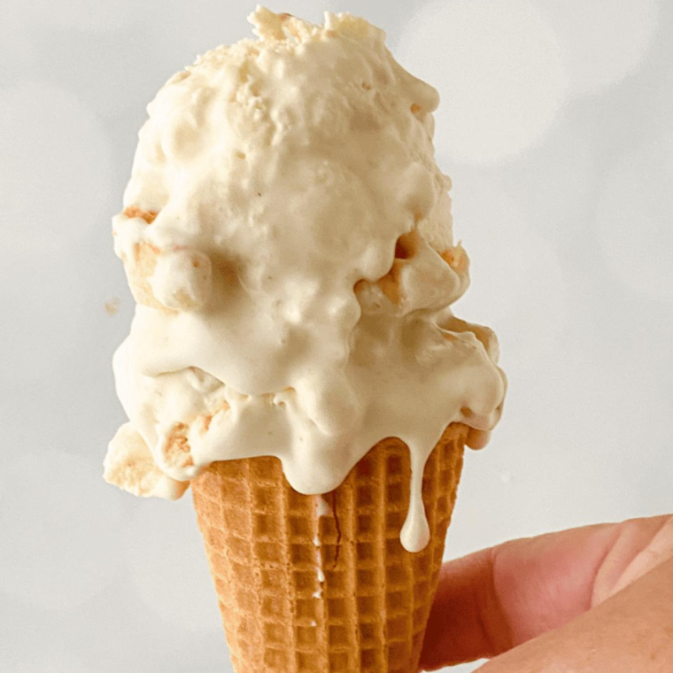 "Close-up of a swirl of creamy Ninja Creami Vanilla Soft Serve in a cone."